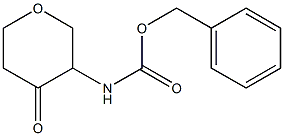 benzyl (4-oxotetrahydro-2H-pyran-3-yl)carbaMate Struktur