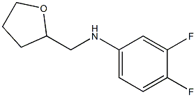 3,4-difluoro-N-(oxolan-2-ylmethyl)aniline Struktur