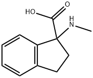 1-(methylamino)-2,3-dihydro-1H-indene-1-carboxylic acid Struktur