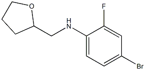 4-bromo-2-fluoro-N-(oxolan-2-ylmethyl)aniline Struktur