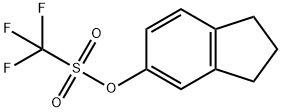 Methanesulfonic acid, 1,1,1-trifluoro-, 2,3-dihydro-1H-inden-5-yl ester