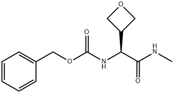 Carbamic acid, N-[(1S)-2-(methylamino)-1-(3-oxetanyl)-2-oxoethyl]-, phenylmethyl ester Struktur