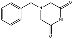 1-Benzyl-3,5-piperazinedione Struktur