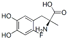 (2S)-2-amino-3-(2-fluoro-4,5-dihydroxy-phenyl)-2-methyl-propanoic acid Struktur