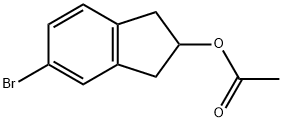 5-broMo-2,3-dihydro-1H-inden-2-yl acetate Struktur