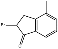 2-BROMO-2,3-DIHYDRO-4-METHYL-1H-INDEN-1-ONE Struktur