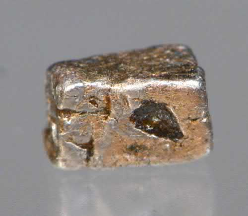 FIGURE 2. Isoferroplatinum, Pt3Fe, grayish gold cubic crystal to 4 mm.