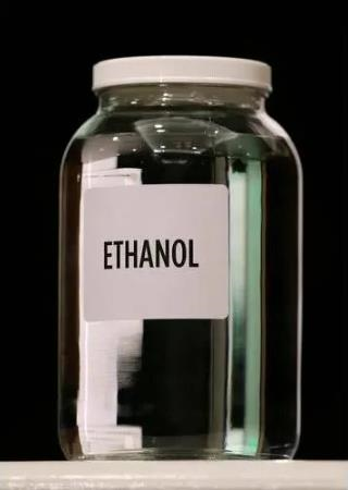 Anhydrous, clear liquid ethanol